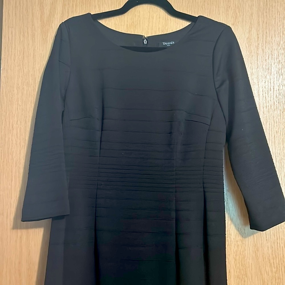 Black fitted quarter sleeve knee length dress